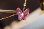 „Dream“-HALSKETTE AUS ROTGOLD MIT SCHMETTERLINGEN UND ROTEN DIAMANTEN